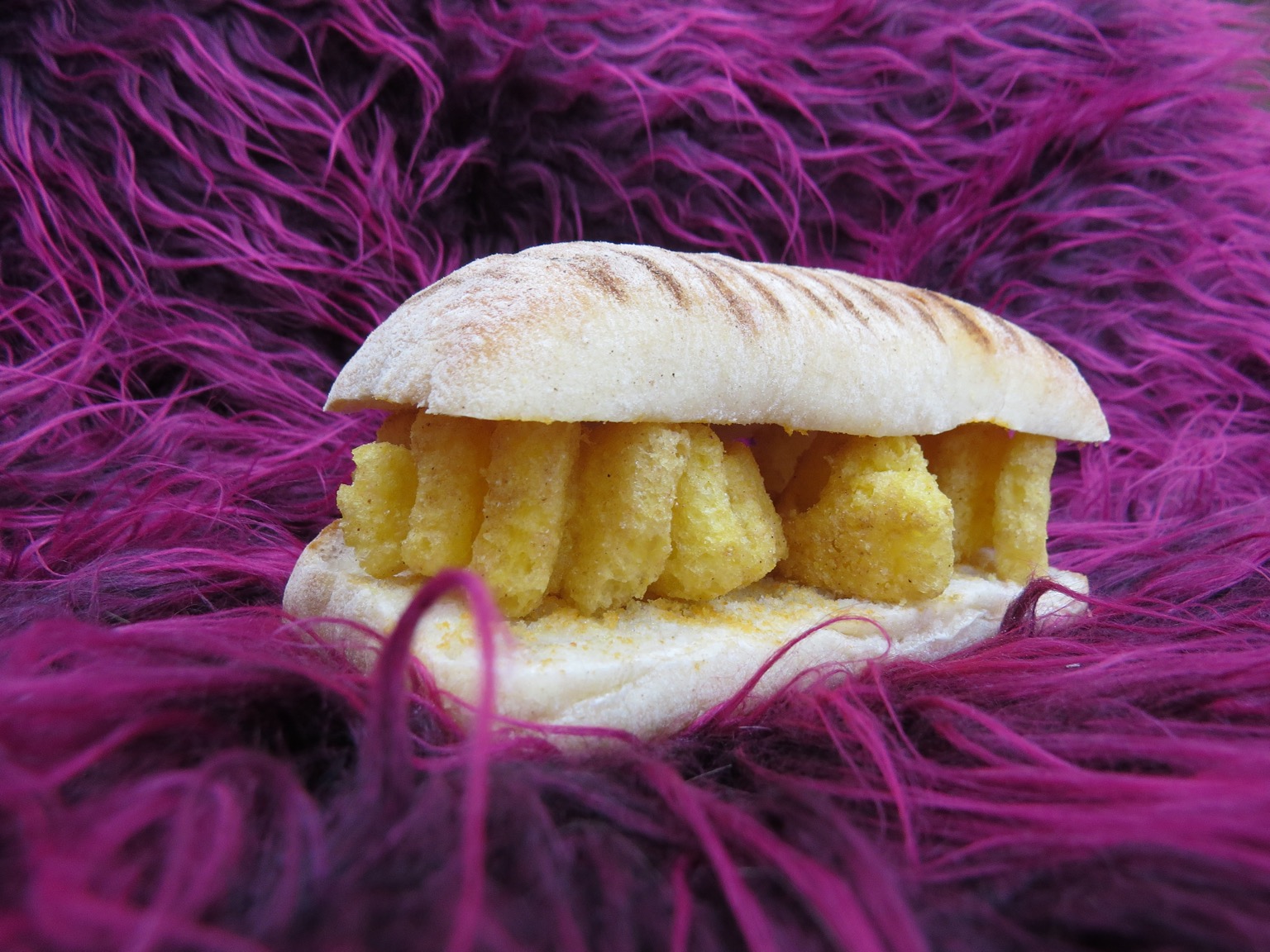 Monster Munch panini on purple fur