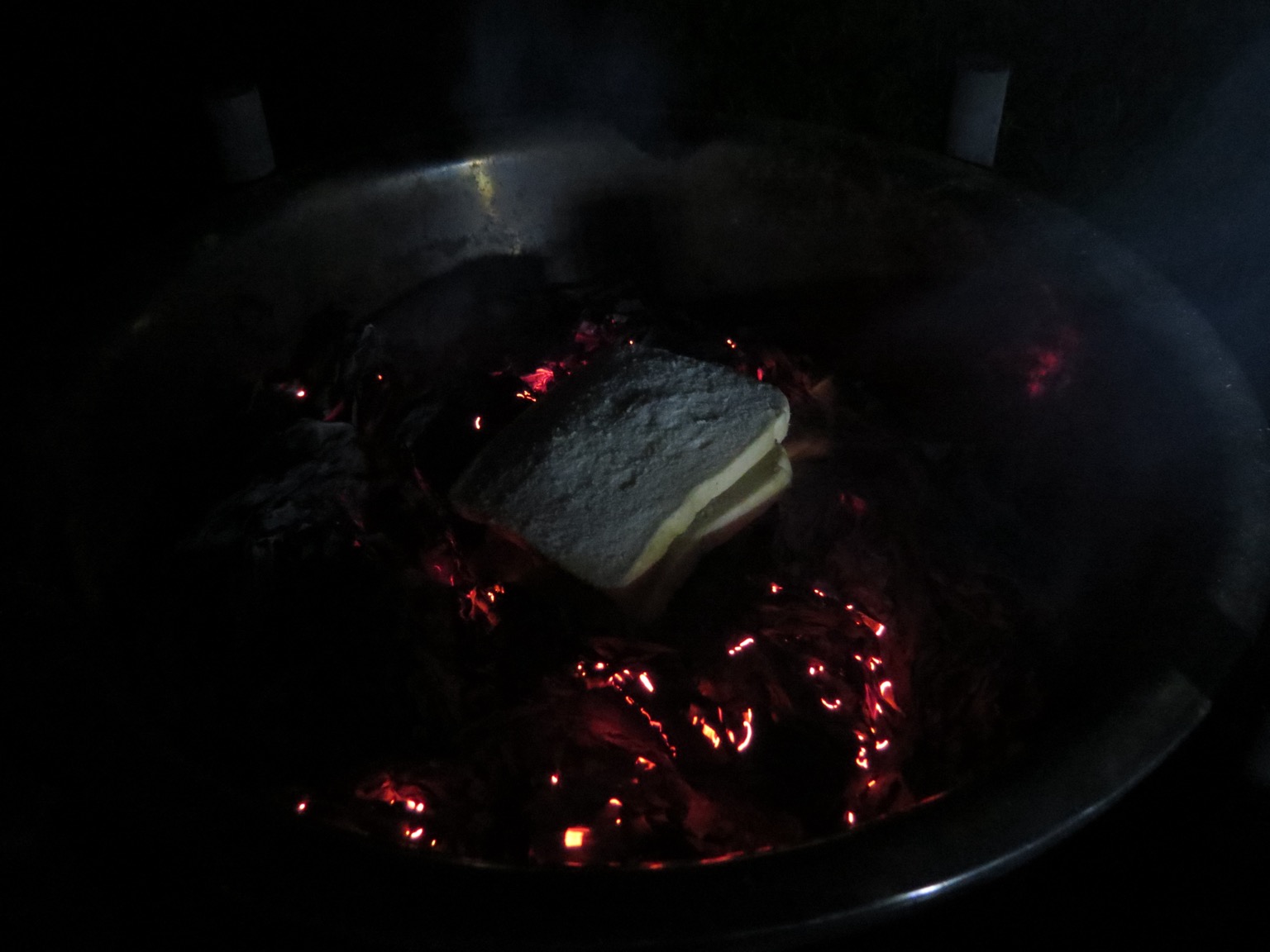 Crisp sandwich sat on glowing embers