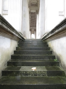 Crisp sandwich on wet steps in front of columns