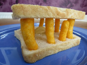 Wotsits columns and single crisp between white bread