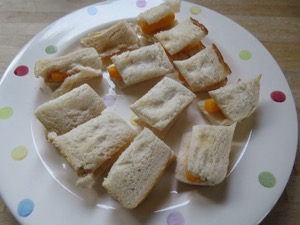 Sandwich split into 12 individual Wotsits mini-sarnies