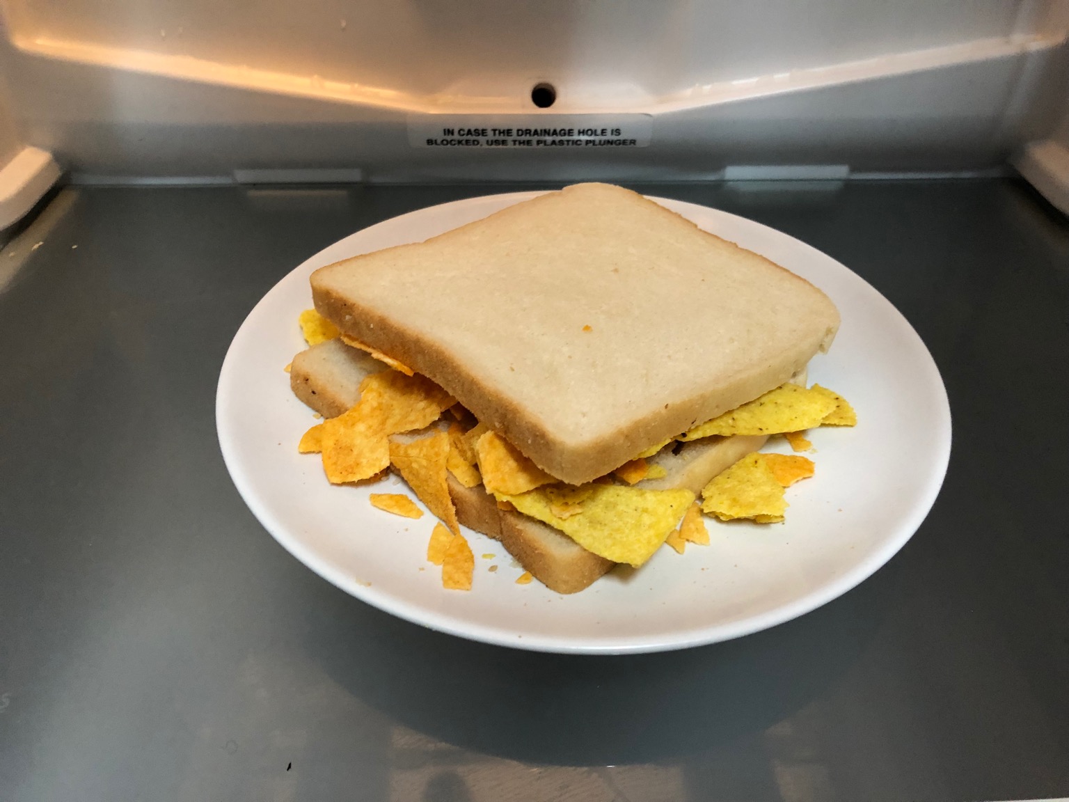 Refrigerated white bread Dorito sandwich