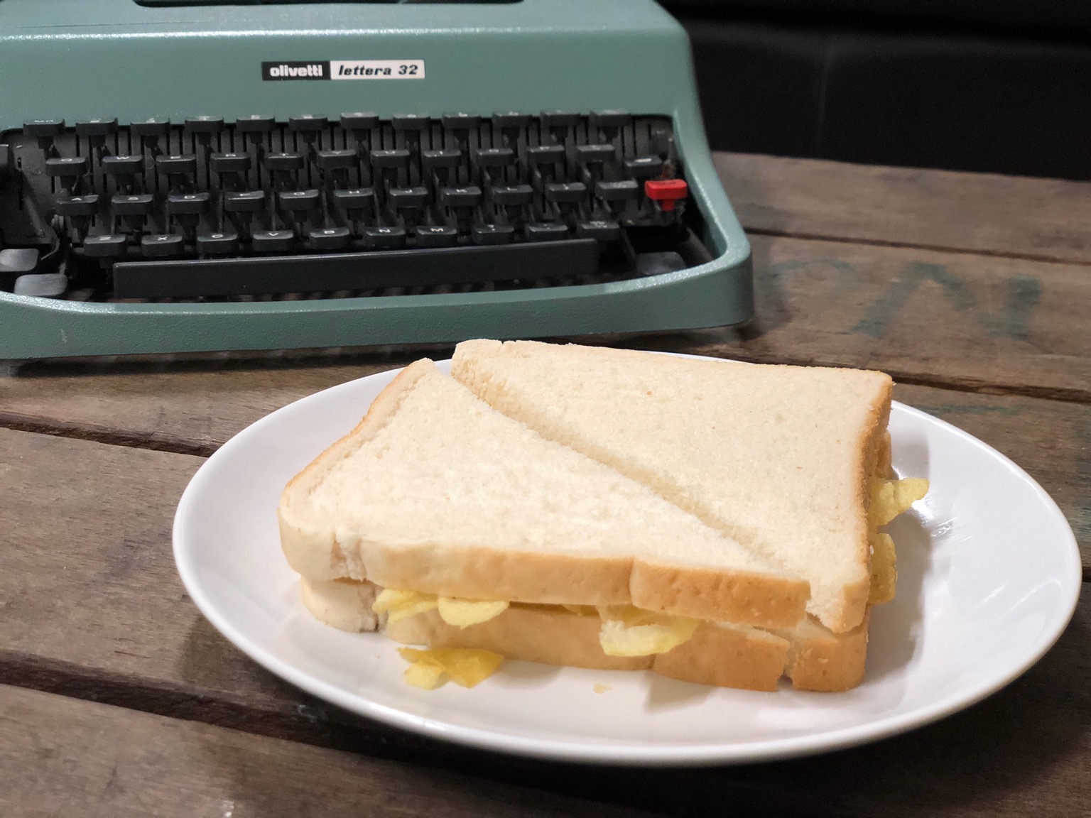 White diagonally-cut crisp sandwich with typewriter