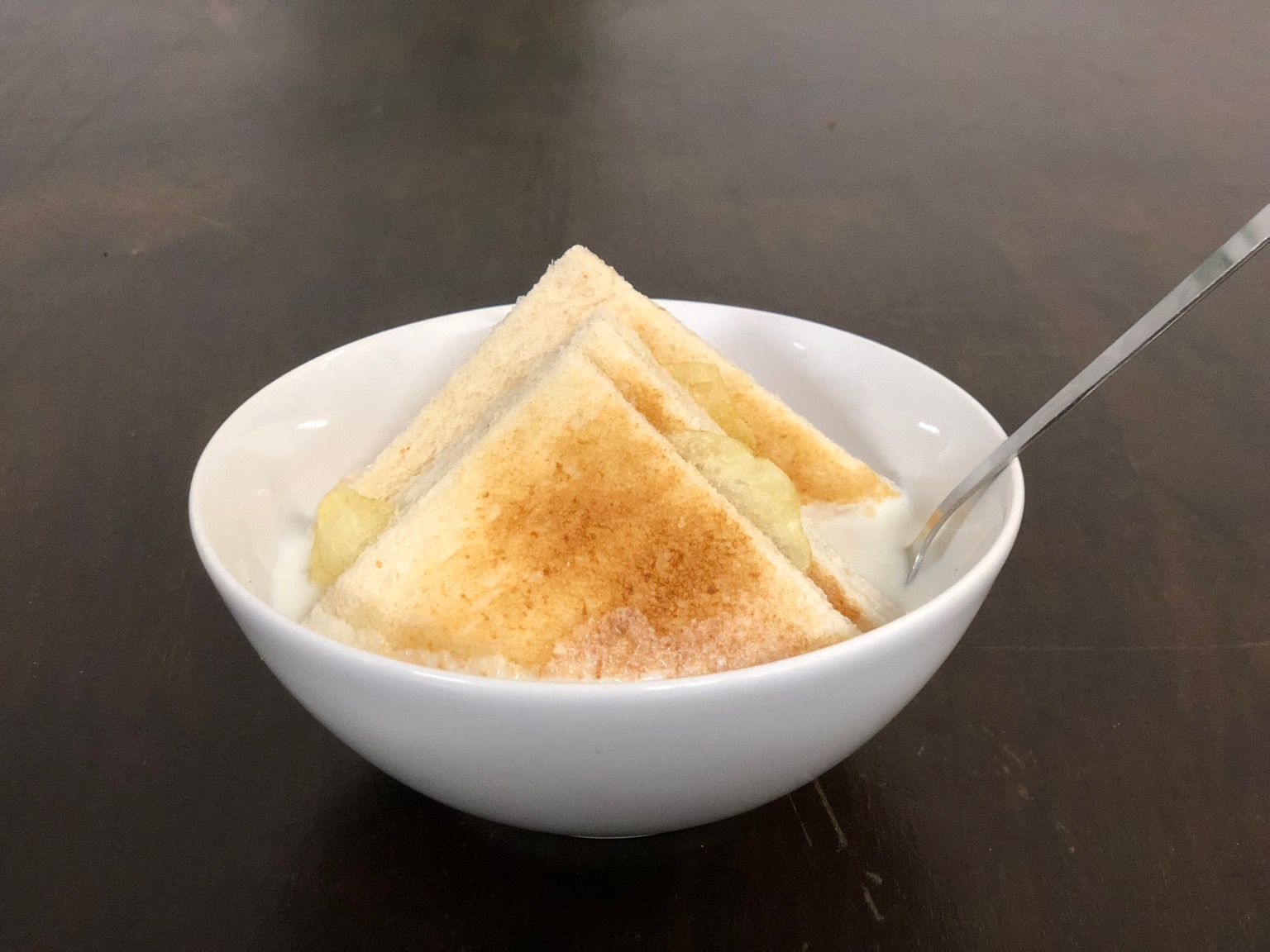 Toasted crustless crisp sandwich in milk