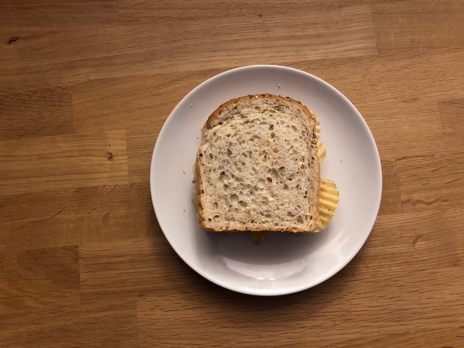 Overhead view of crisps in multigrain bread