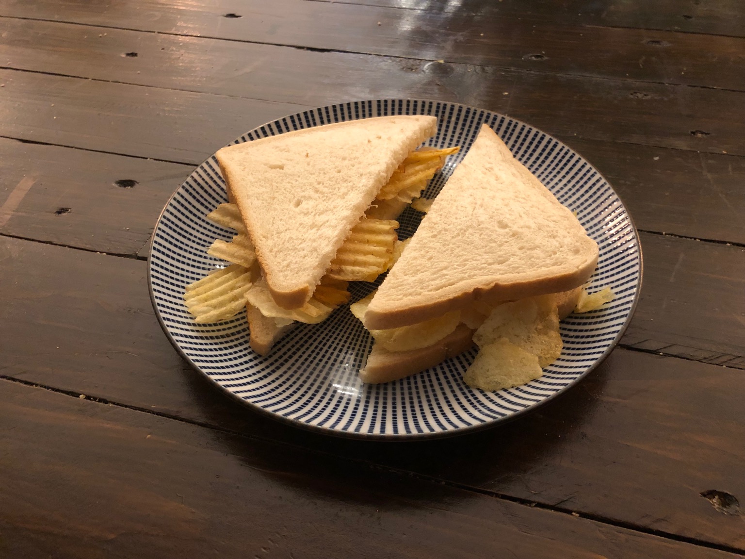 White crinkle-cut crisp sandwich cut diagonally