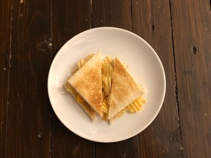 Overhead view of crinkle-cut crisps in toast