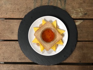 Artistic overhead view of Doritos in brown bread