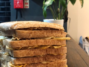 Top of brown loaf filled with crinkle-cut crisps