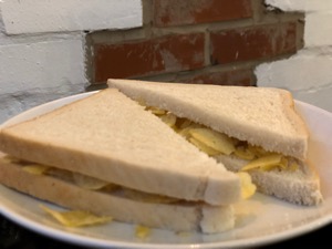 Close-up of diagonally-cut crisp sandwich