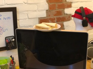 Diagonally-cut crisp sandwich on a monitor