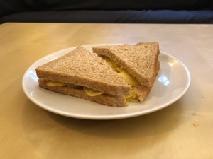 Brown bread containing potato crisps