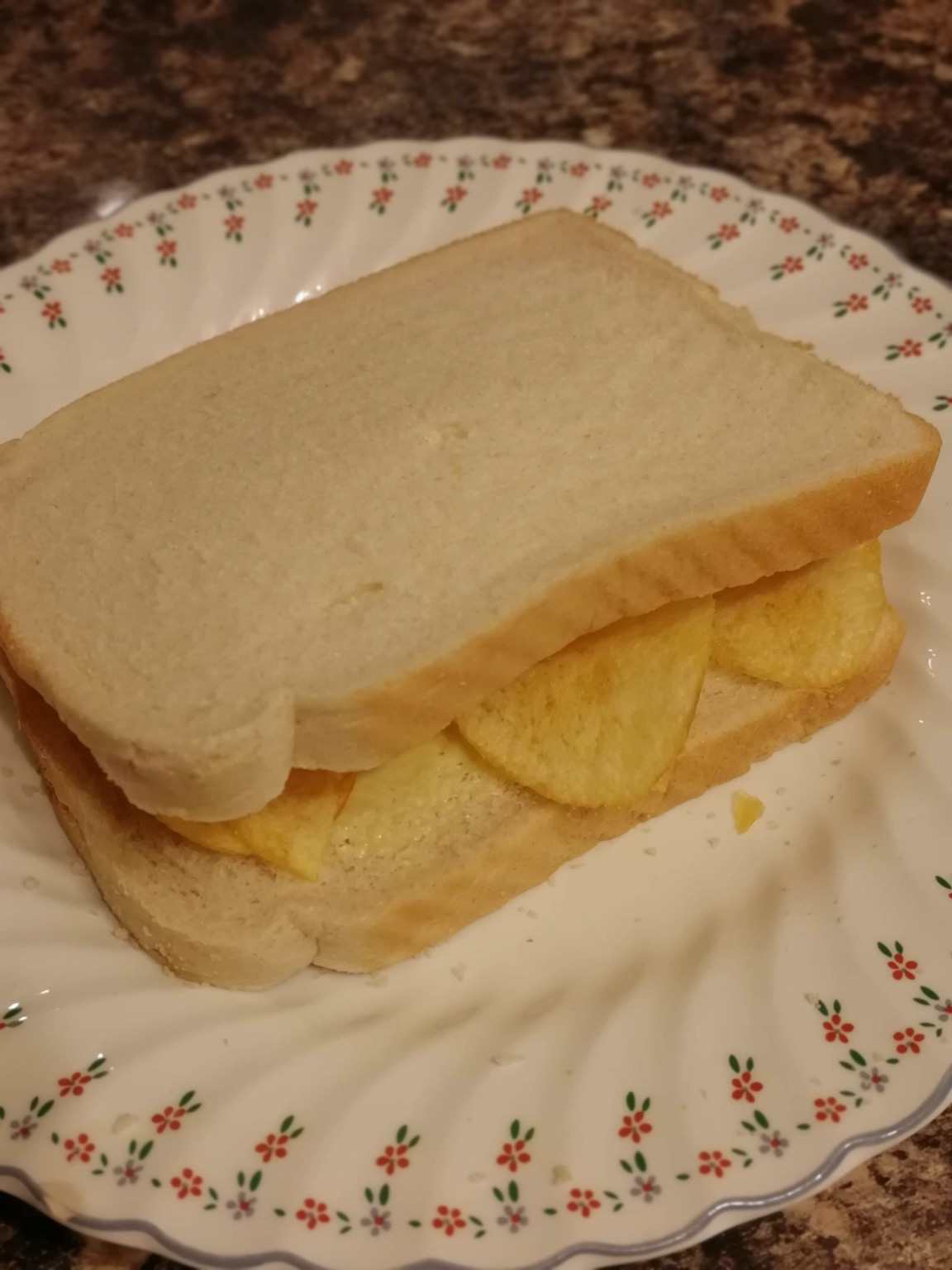 Close up of white crisp-filled sandwich