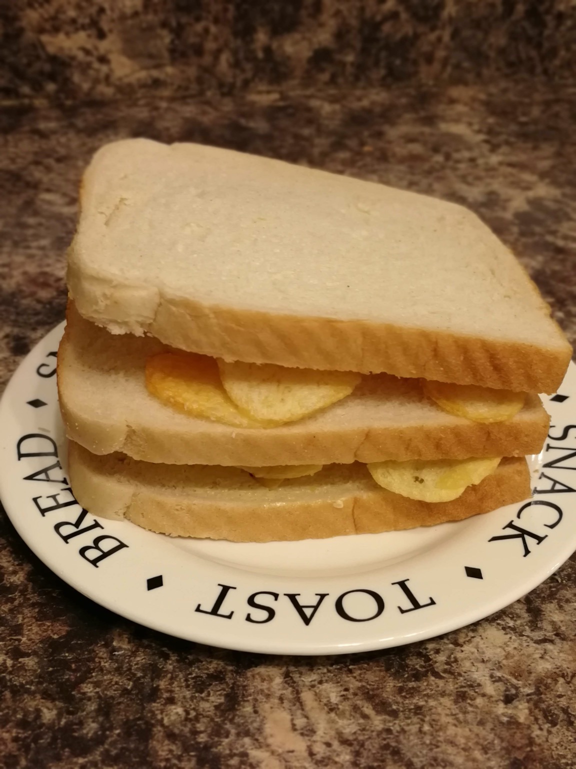 Double decker white bread potato crisp sandwich