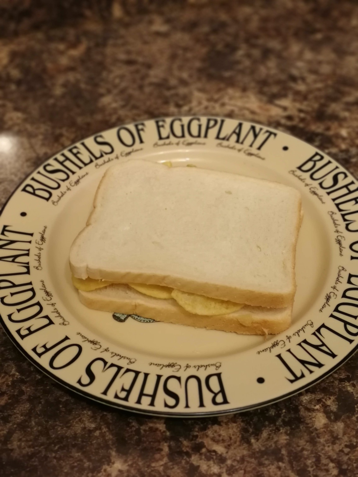 White crisp-filled sandwich on a typographic plate