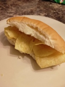 Close up of crisp-filled white finger roll