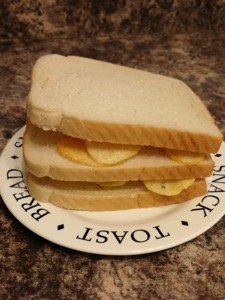 Double decker white bread potato crisp sandwich