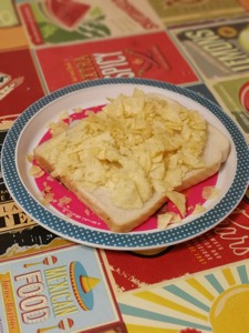 Open white crisp sandwich on a plate