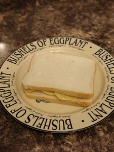 White crisp-filled sandwich on a typographic plate