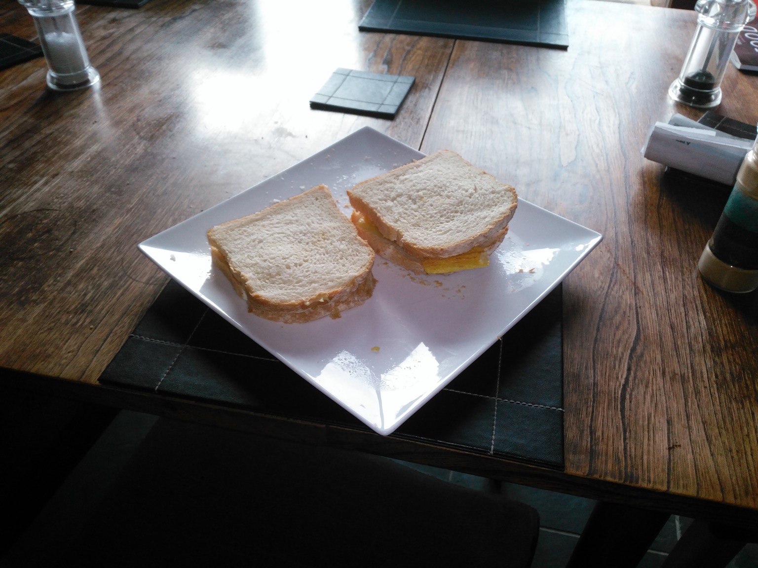 Two Frazzles sandwiches with white sliced bread