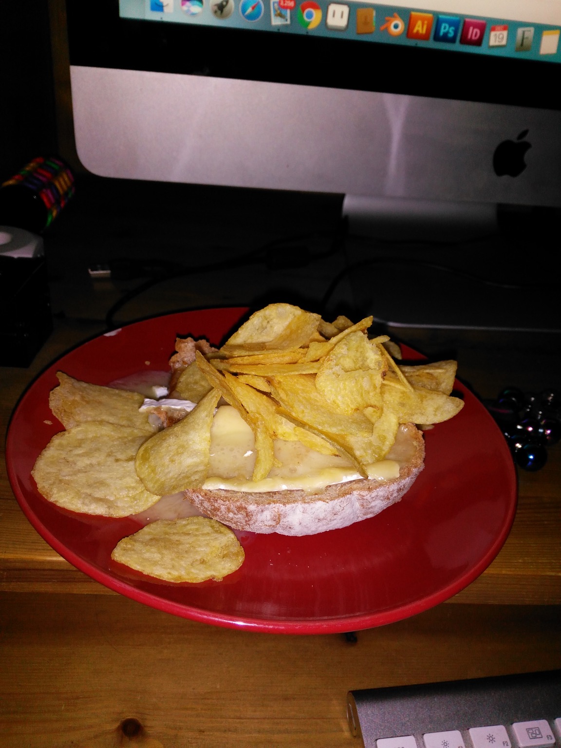 Flash photo of crisps and brie on sliced white bread