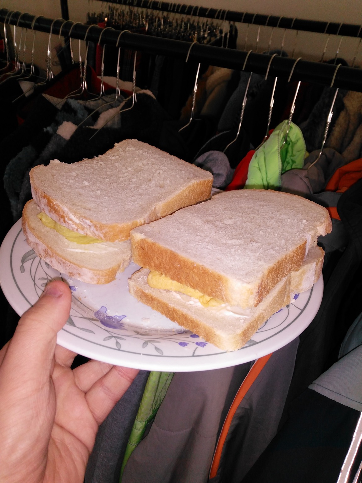 Flash photo of crisp sandwiches in a wardrobe