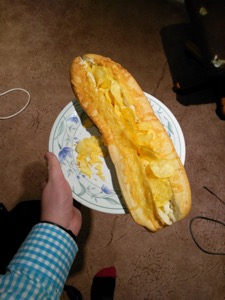 Cheesy baguette filled with potato crisps