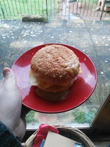 Potato crisps in a bun topped with sesame seeds