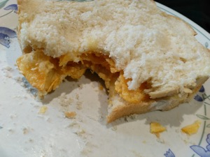 Close-up of crisp sandwich with a bite out of it