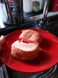 White crisp sandwich with crust slice in use