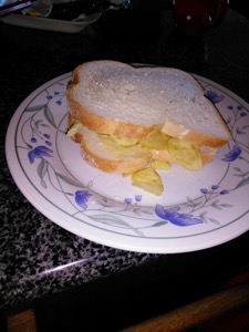 Flash photo of sliced white bread containing crisps