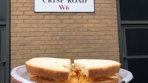 Camera pan from crisp sandwich to Crisp Road sign