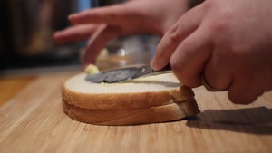 Montage of a crisp sandwich being made and eaten