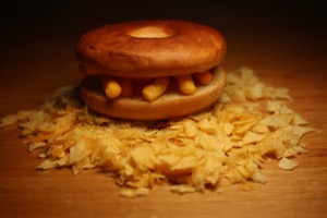 Wotsits bagel sitting on a bed of crushed crisps