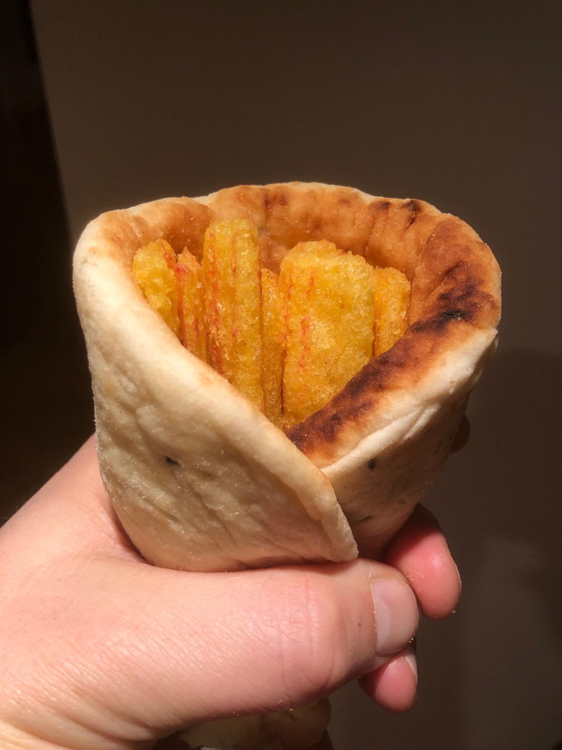 Naan bread wrapped around Frazzles