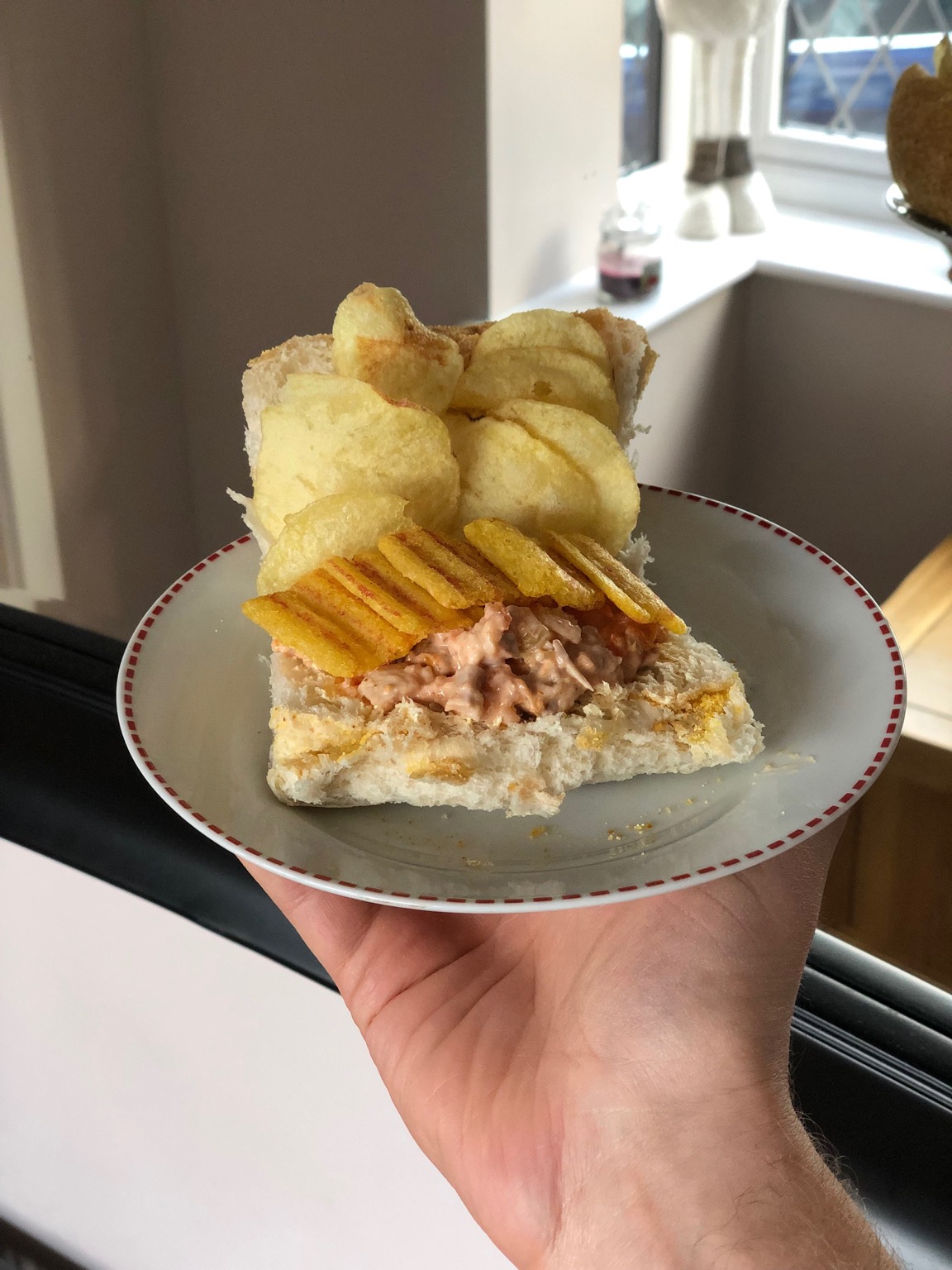 Crisps, Frazzles and more in an open white roll