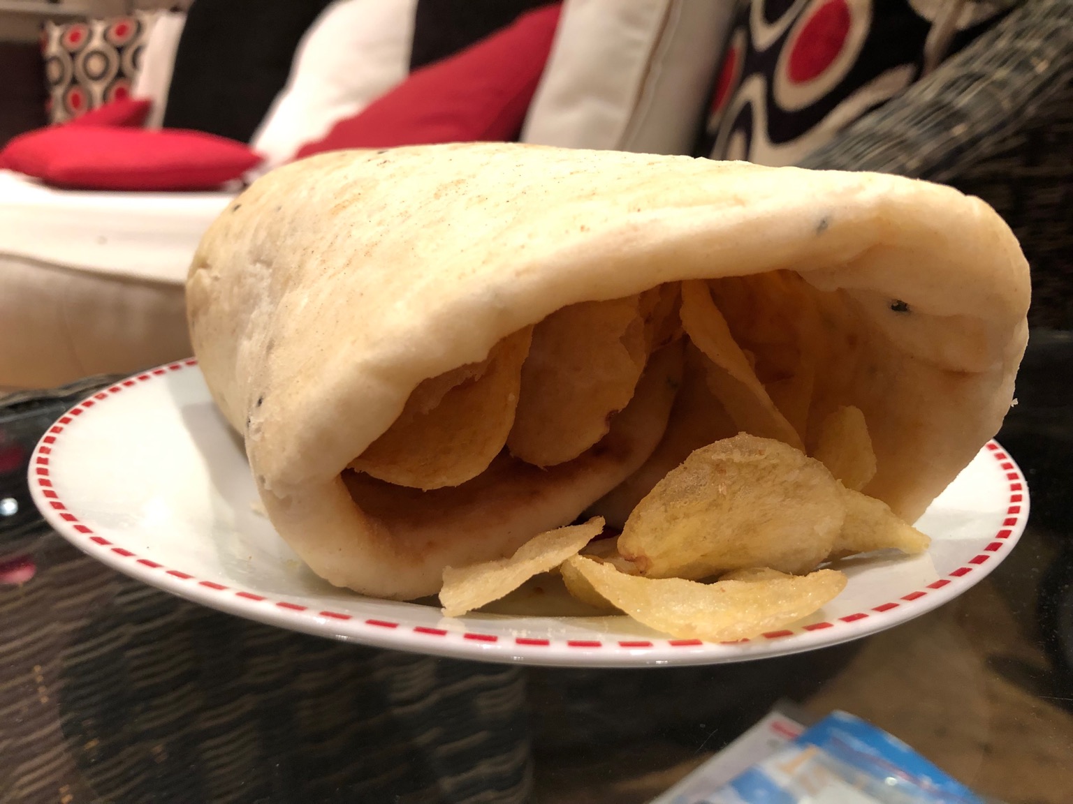 Close-up of naan bread wrapped around crisps