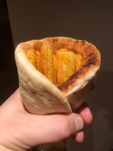 Naan bread wrapped around Frazzles