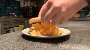 Time lapse of making and eating a Quavers sandwich