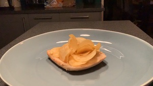 Potato crisps on white bread rotating