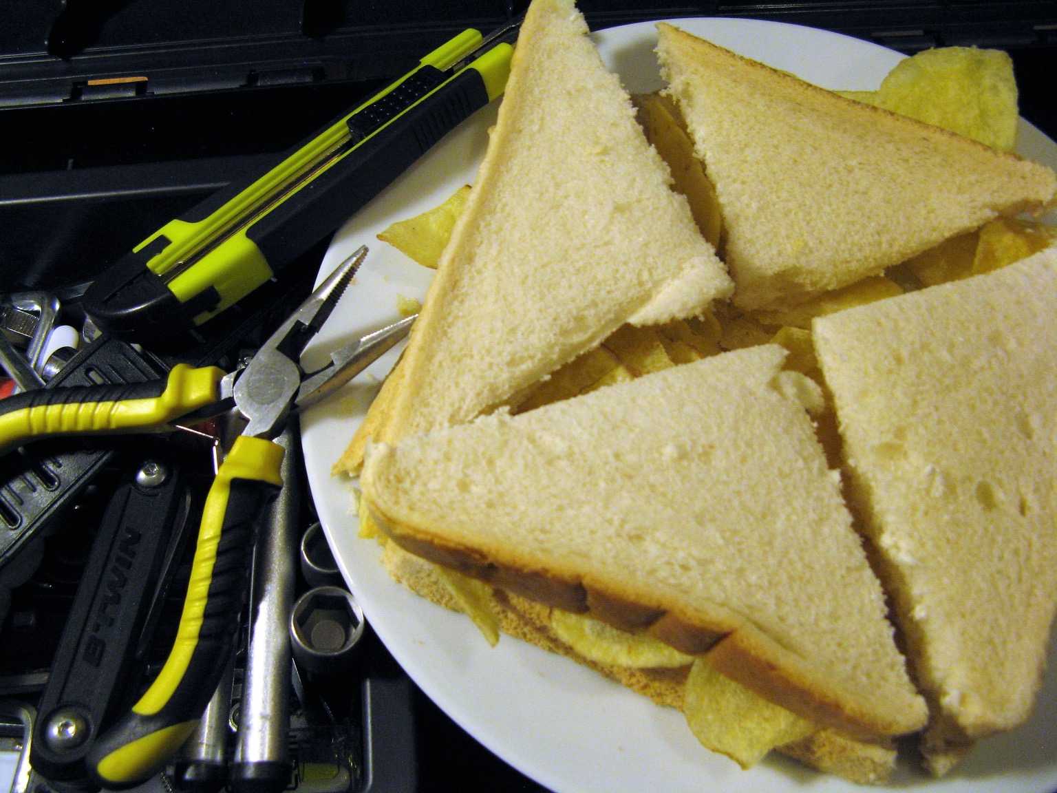 Quartered crisp sandwich in a toolkit