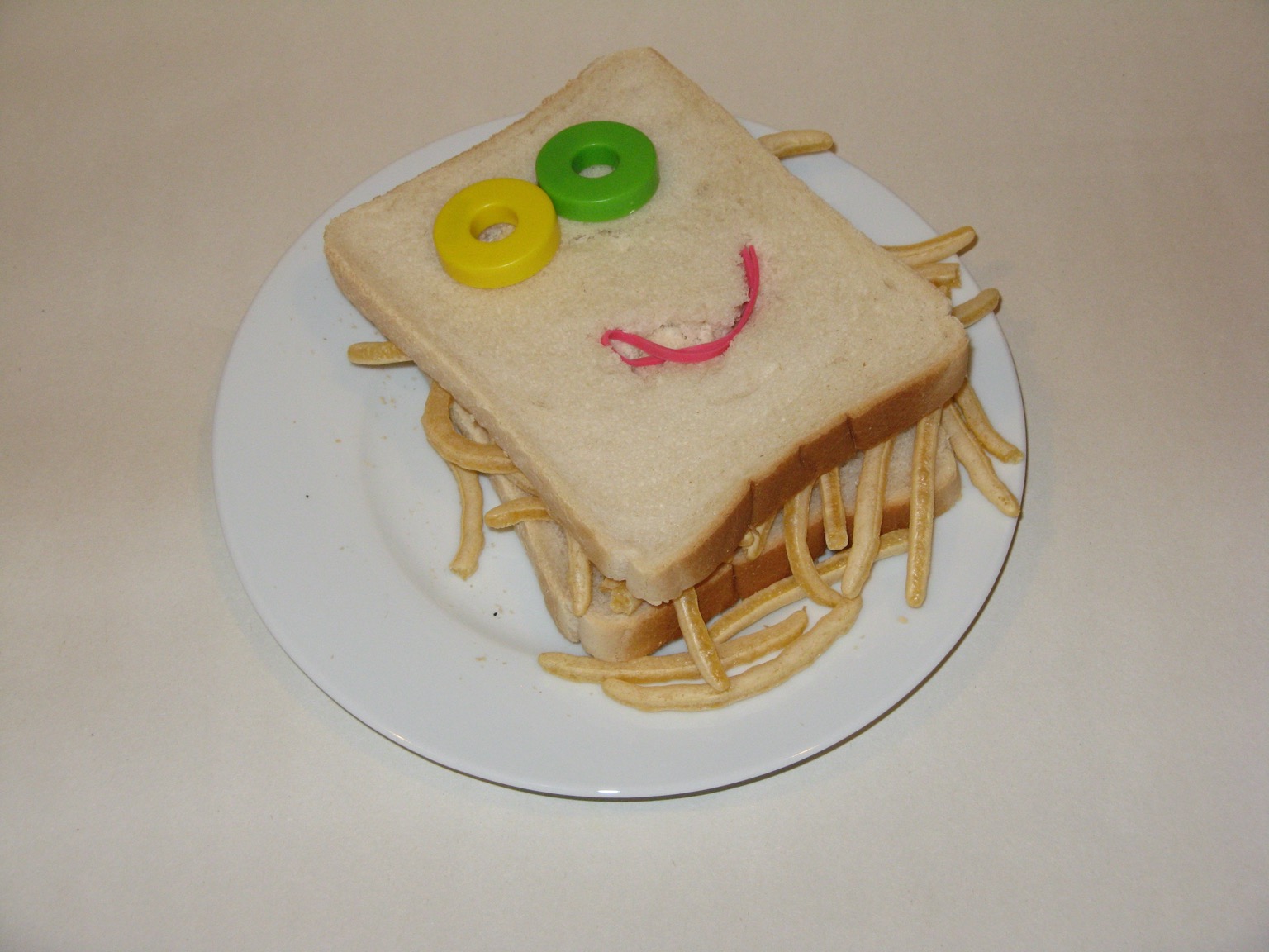 White French Fries sandwich with a smiley face