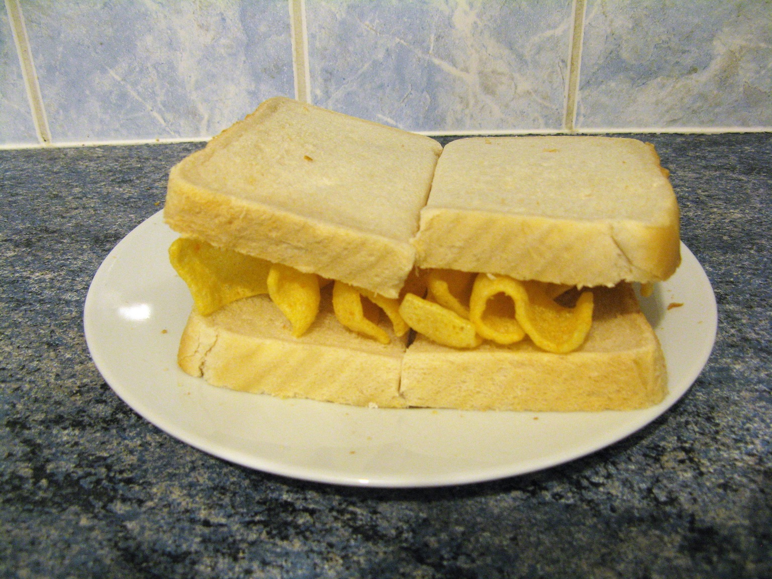 White Quaver sandwich sliced in two