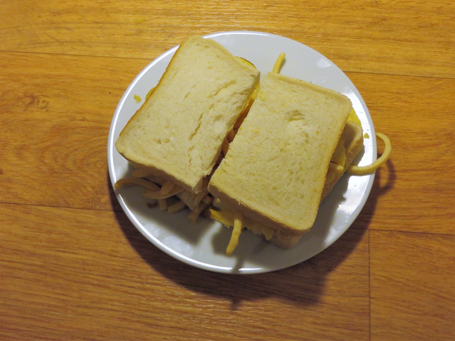 Overhead view of French Fries snacks in white bread