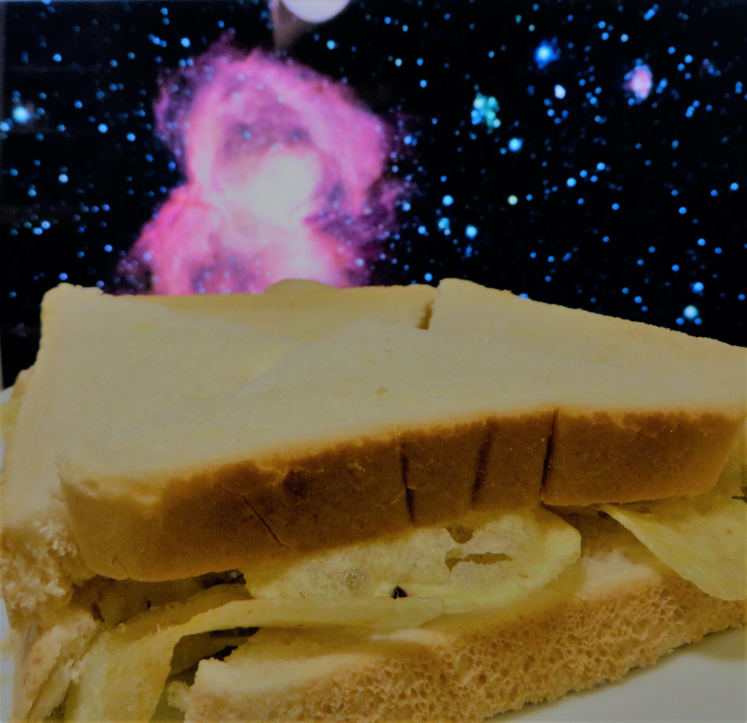 Quartered white crisp sandwich with space backdrop