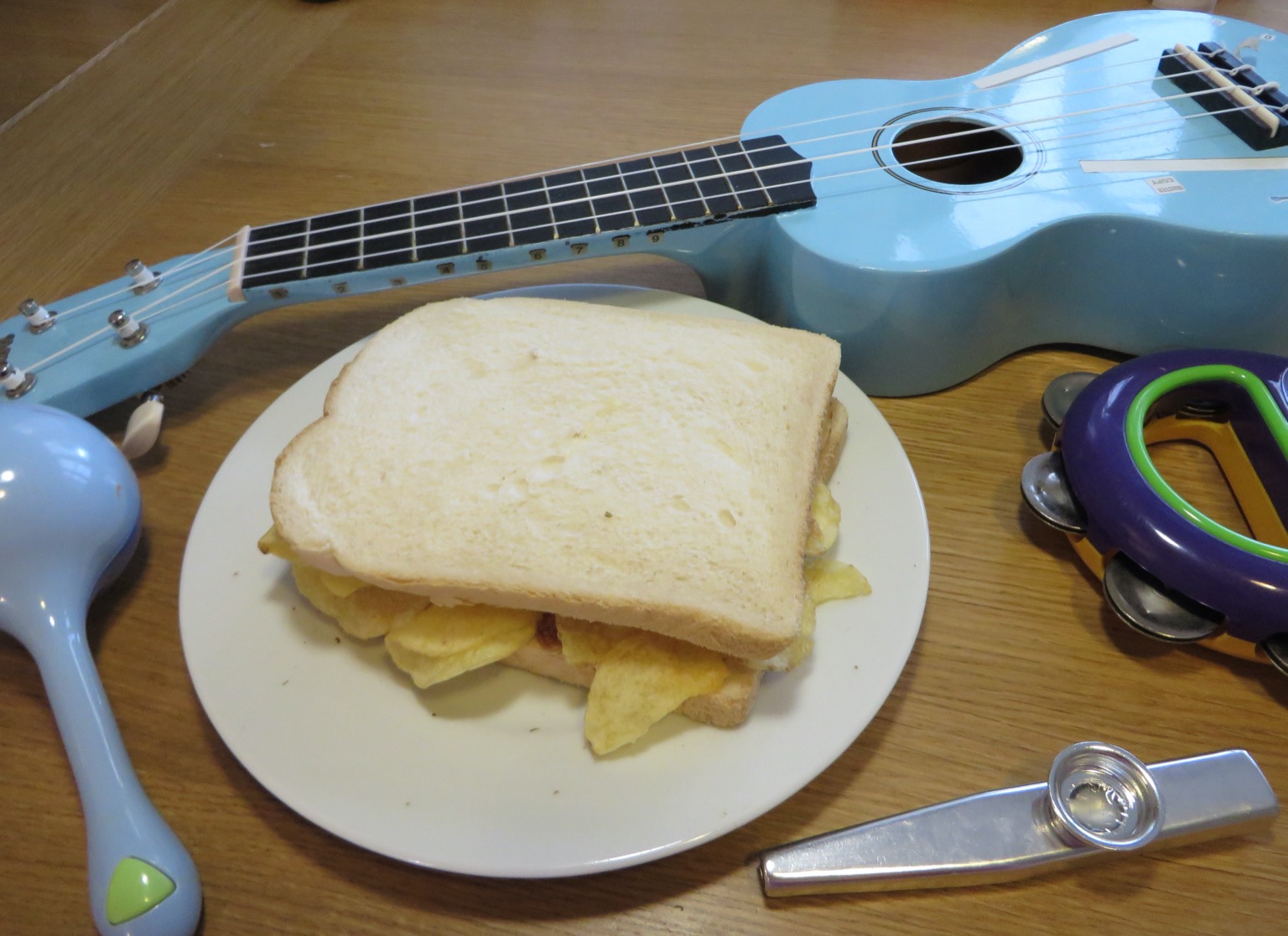 White crisp sandwich among musical instruments