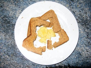 Overhead view of brown crisp sandwich remnants