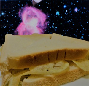 Quartered white crisp sandwich with space backdrop