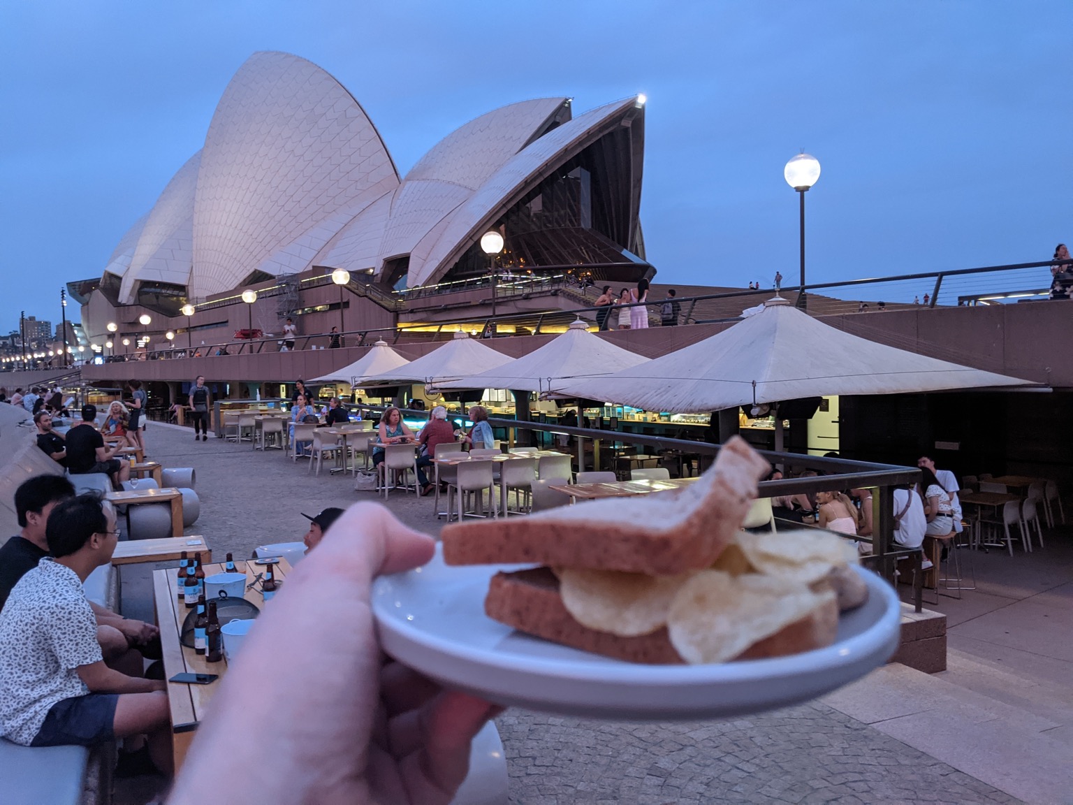 Sydney Opera House and bar behind a crisp sandwich