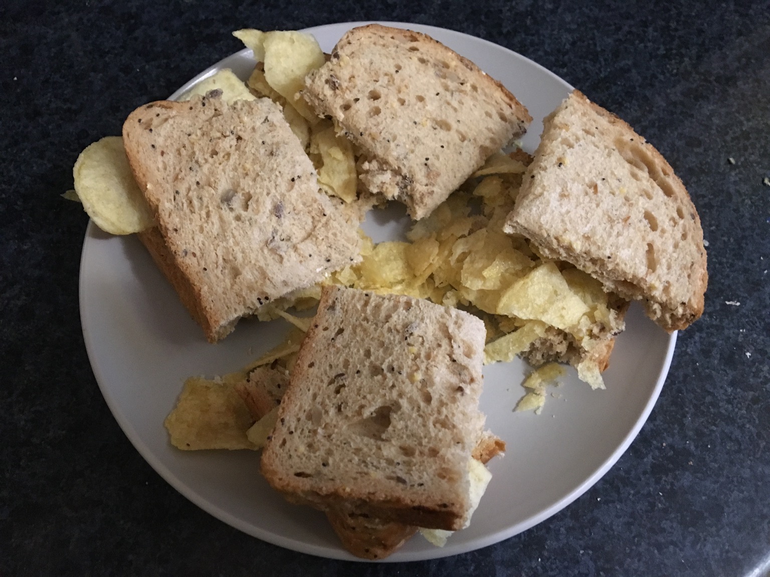 Brown crisp sandwich cut up into quarters